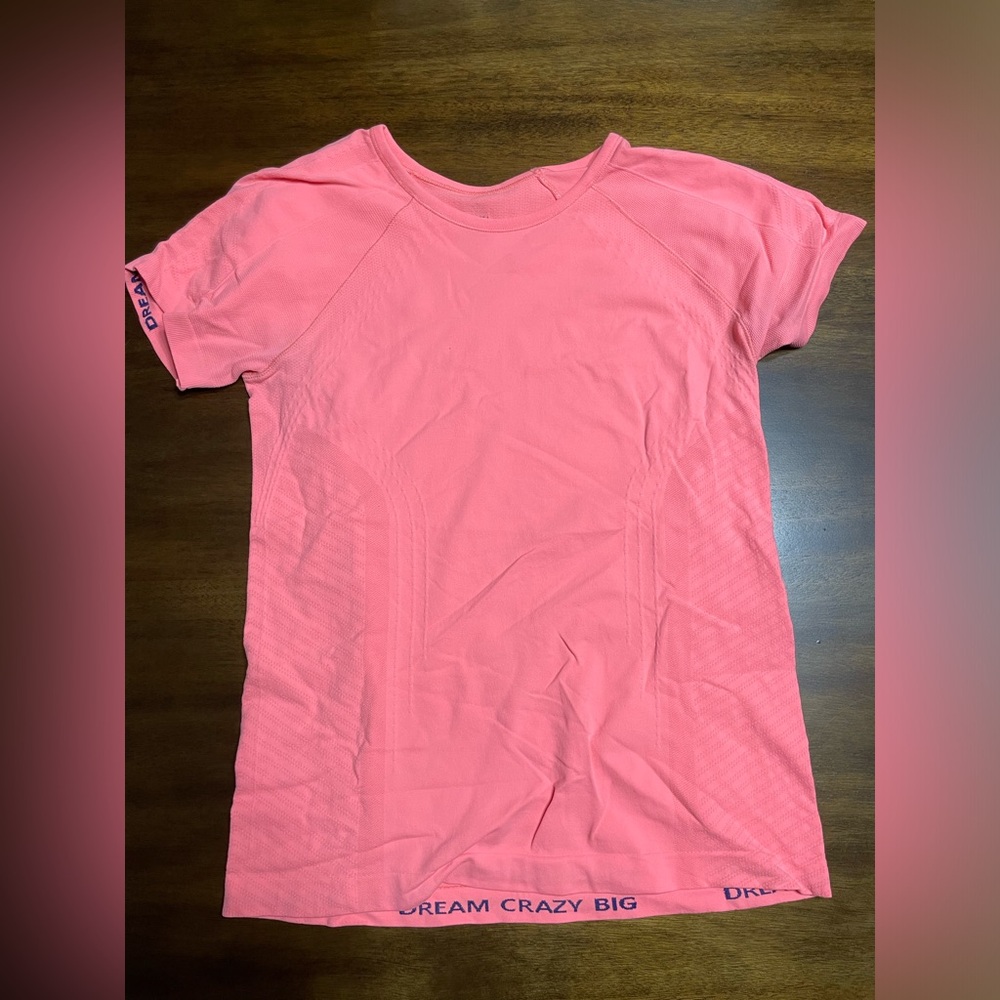 Athleta pink kids size XL fits as a women’s small
